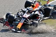 Notice the halo protecting Hamilton's head as Verstappen's rear right climbs on the car, 2021, Monza (Photo by Peter Van Egmond/Getty Images)